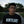 Load image into Gallery viewer, Athlete wearing black RULERS t-shirt with bold white GENTELART text – streetwear style portrait